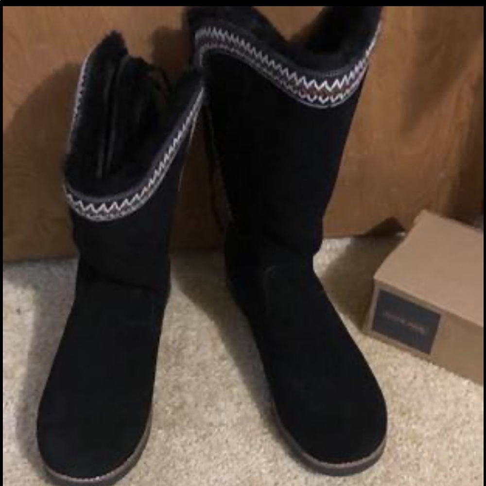 Size 10 wide brand new boots! 100.00